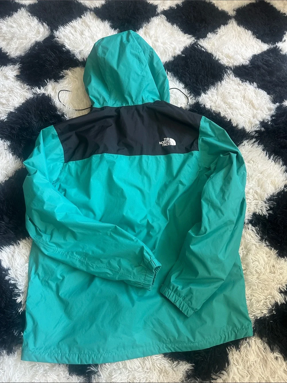 The North Face Teal and Black Hooded Rain Jacket